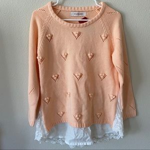 peach sweater with lace inset
